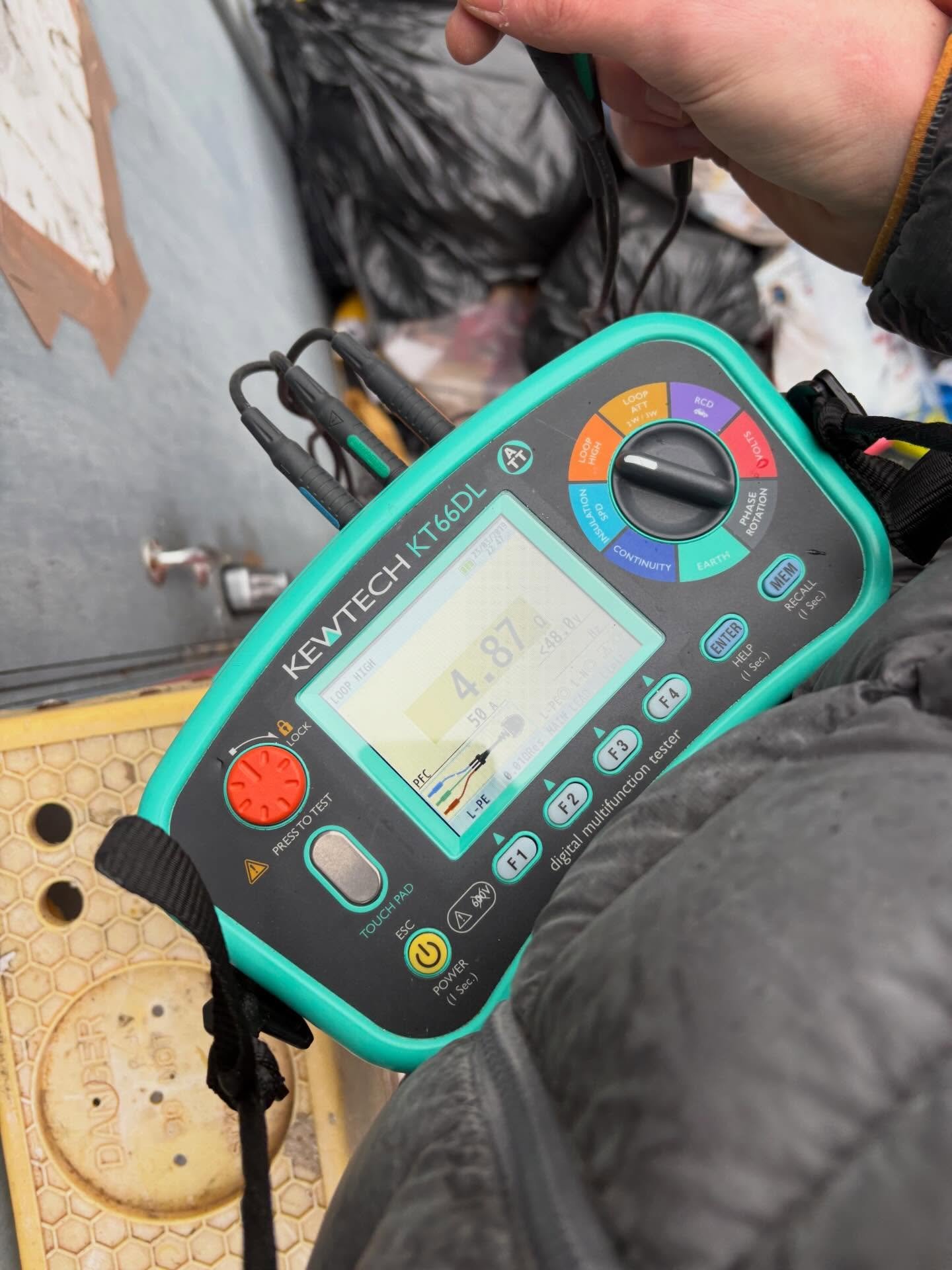 Kewtech KT66DL multifunction tester displaying loop impedance reading during testing