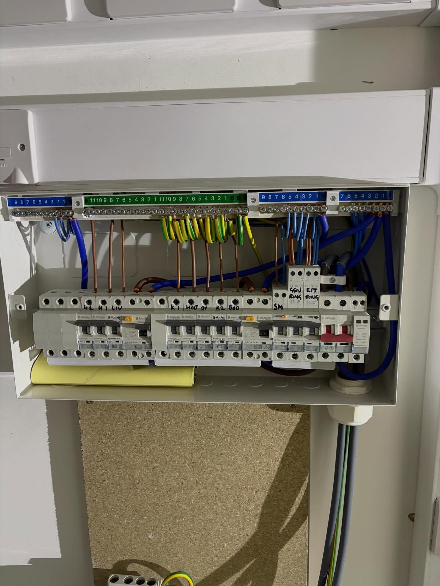Close-up of badly scorched MCB and burned wiring at consumer unit terminals